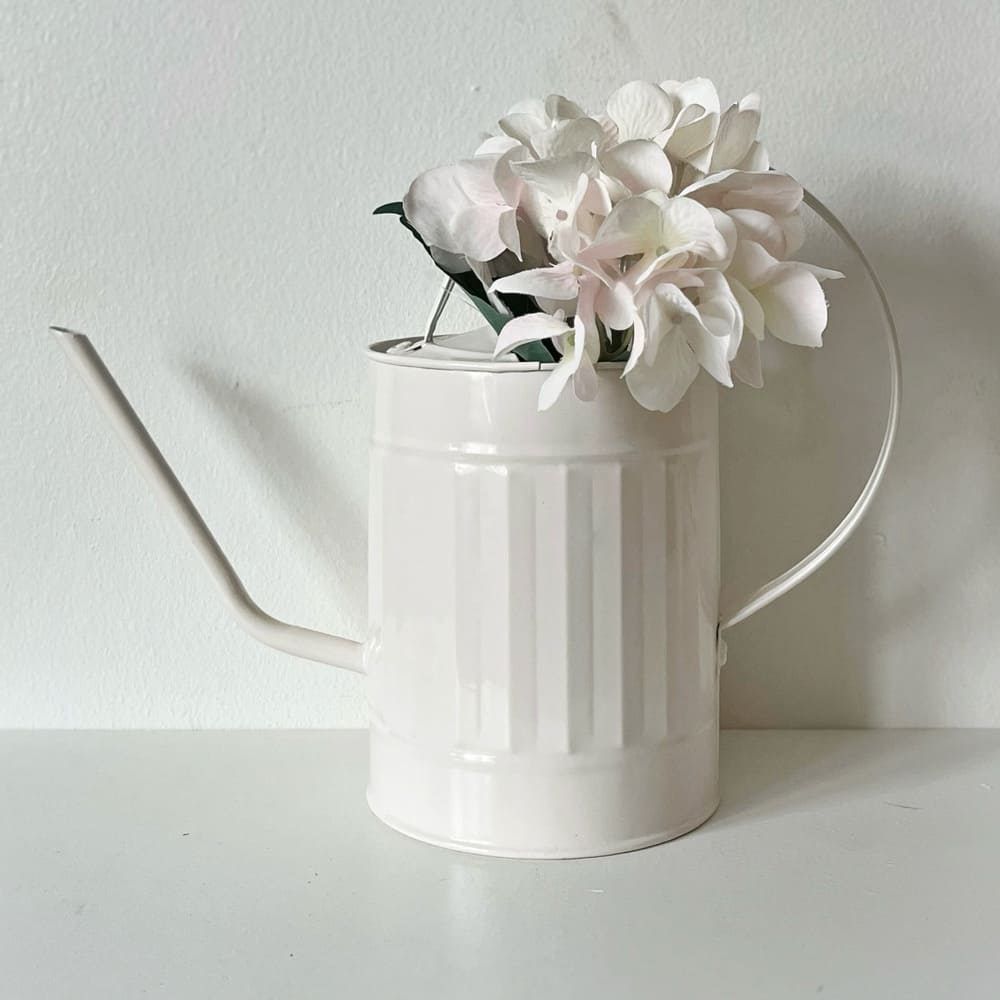 kastelukannu valkoinen lapinpöllön paja