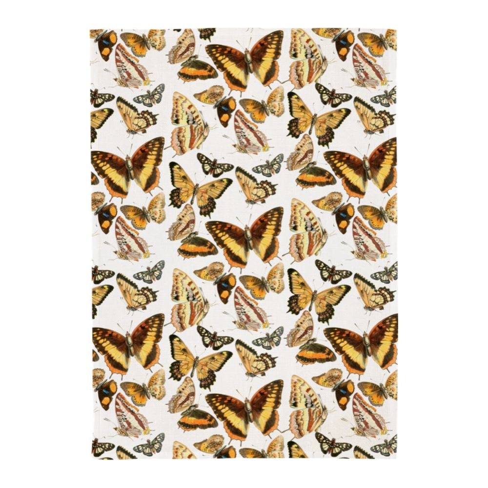 keittiöpyyhe jossa perhoskuvio valkoisella taustalla